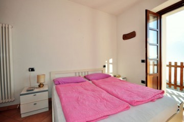 Schlafzimmer mit Balkon